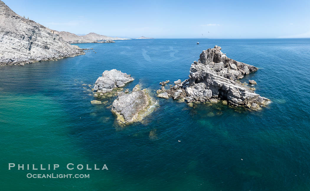 Aerial photo of Islas San Lorenzo in the Sea of Cortez. San Lorenzo Marine Archipelago National Park is a national park of Mexico located on San Lorenzo Island part of an archipelago in the Gulf of California off the eastern coast of Baja California. The San Lorenzo Archipelago is considered one of the most important ecological areas of the Gulf of California. The Island and surrounding areas are part of a rich ecosystem comprised by a grand variety of flora and marine fauna. This area is protected by the Mexican federal government Norma Oficial Mexicana because of its importance as a habitat for several endangered species Aerial photo of Islas San Lorenzo in the Sea of Cortez. San Lorenzo Marine Archipelago National Park is a national park of Mexico located on San Lorenzo Island part of an archipelago in the Gulf of California off the eastern coast of Baja California. The San Lorenzo Archipelago is considered one of the most important ecological areas of the Gulf of California. The Island and surrounding areas are part of a rich ecosystem comprised by a grand variety of flora and marine fauna. This area is protected by the Mexican federal government Norma Oficial Mexicana because of its importance as a habitat for several endangered species