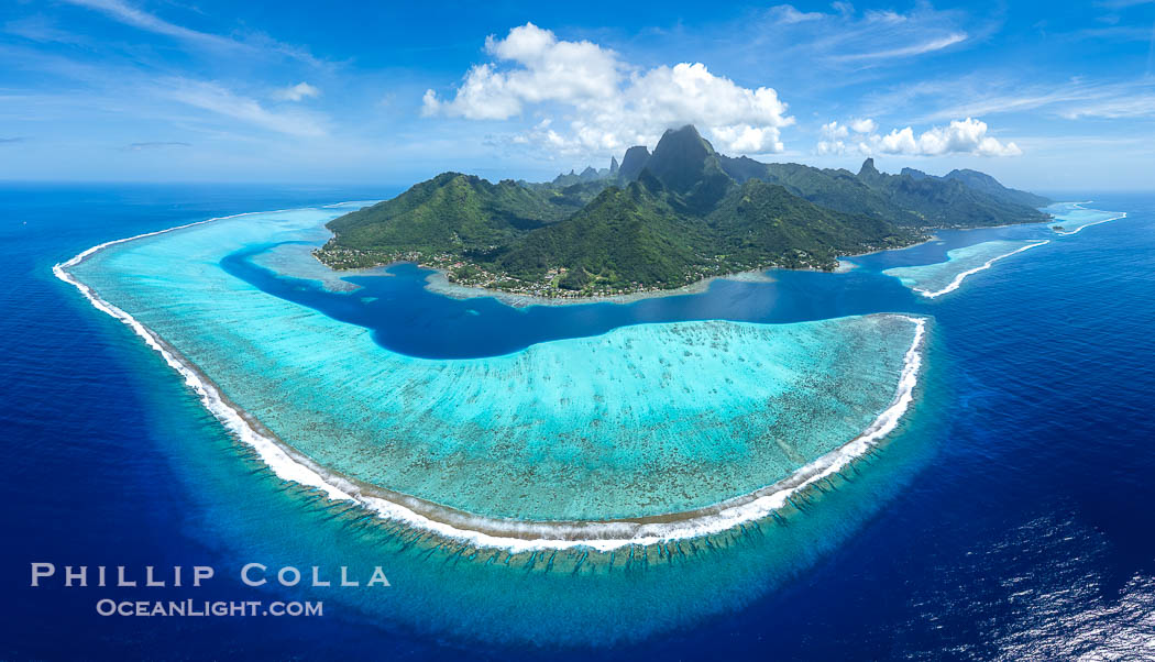 Aerial Panorama of the Barrier Reef around Moorea Island, French Polynesia. The outer reef slope is seen adjacent to deep blue oceanic water with white waves breaking against the reef edge. Next, a wide shallow reef flat occurs dotted with coral bommies. Inside of that, a shallow protected lagoon is formed against the island. Tall, rugged, eroded mountains are seen hinting at the age of the ancient volcano that originally formed the island and that is now sinking back down, leaving the encircling reef behind, Megaptera novaeangliae Aerial Panorama of the Barrier Reef around Moorea Island, French Polynesia. The outer reef slope is seen adjacent to deep blue oceanic water with white waves breaking against the reef edge. Next, a wide shallow reef flat occurs dotted with coral bommies. Inside of that, a shallow protected lagoon is formed against the island. Tall, rugged, eroded mountains are seen hinting at the age of the ancient volcano that originally formed the island and that is now sinking back down, leaving the encircling reef behind, Megaptera novaeangliae