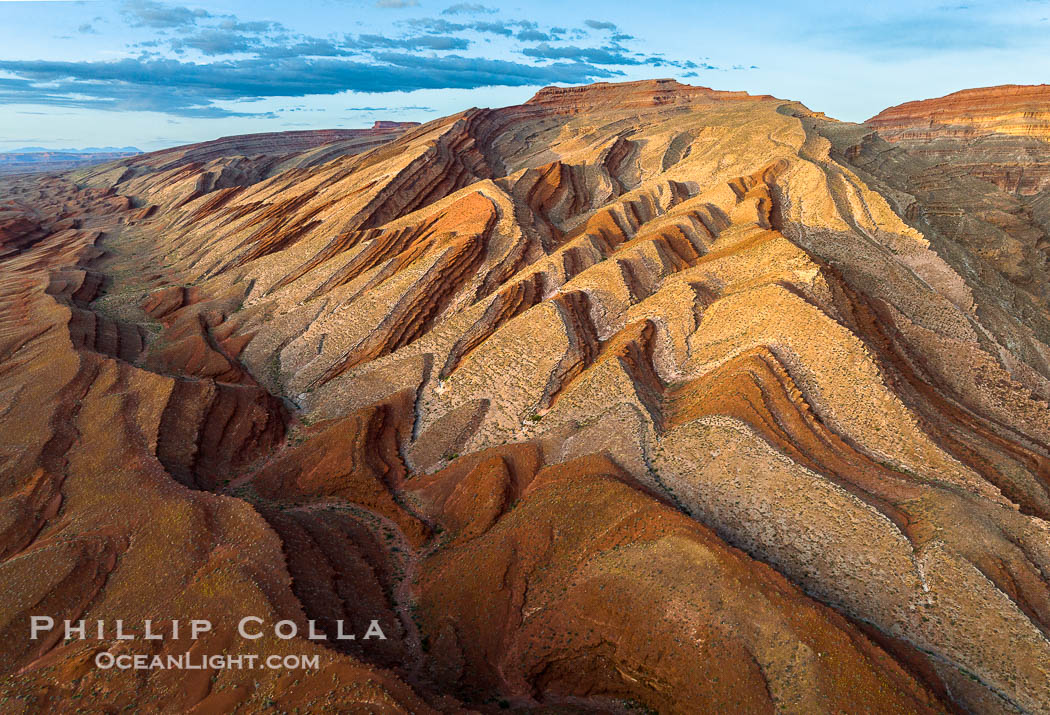 Aerial Photo of Raplee Ridge near Mexican Hat, Utah. Raplee Ridge is a spectacular series of multicolored triangular flatirons near the San Juan River.  Often called "the Raplee Anticline" the geologic structure is in fact better described as a monocline, according to the Utah Geological Survey. USA, natural history stock photograph, photo id 39489