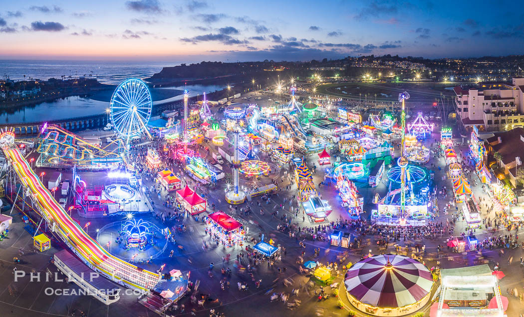 The San Diego County Fair at night, also called the Del Mar Fair, glows with many colorful lights and amusement rides at night in this aerial photo. California, USA, natural history stock photograph, photo id 39486