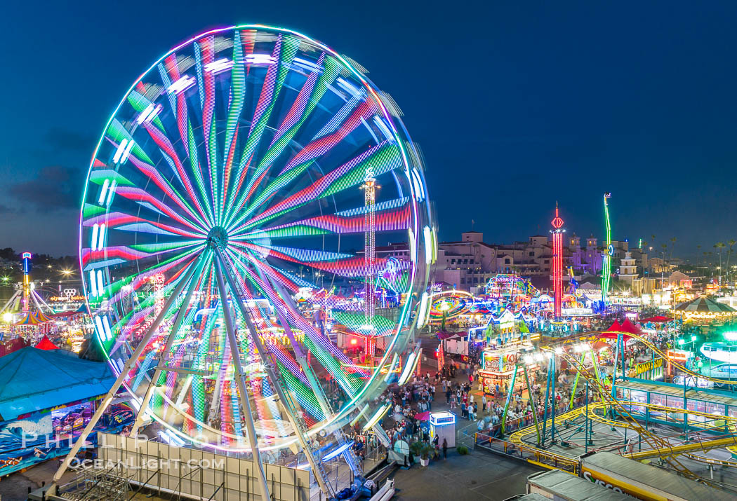 The San Diego County Fair at night, also called the Del Mar Fair, glows with many colorful lights and amusement rides at night in this aerial photo. California, USA, natural history stock photograph, photo id 39484