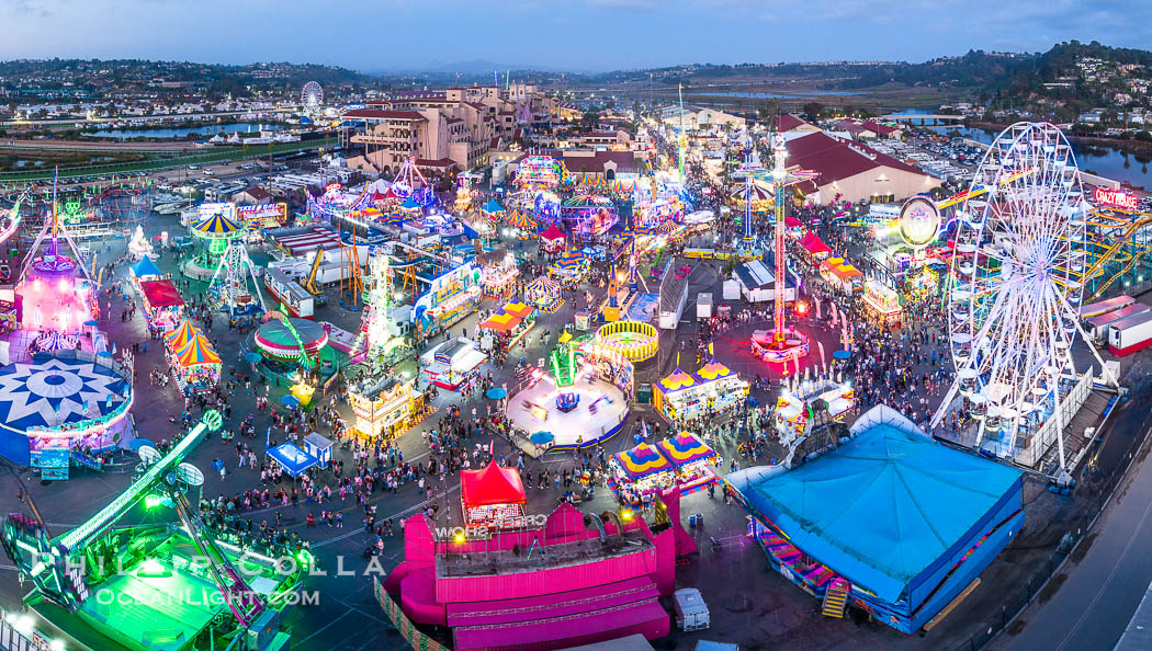 The San Diego County Fair at night, also called the Del Mar Fair, glows with many colorful lights and amusement rides at night in this aerial photo. California, USA, natural history stock photograph, photo id 39483