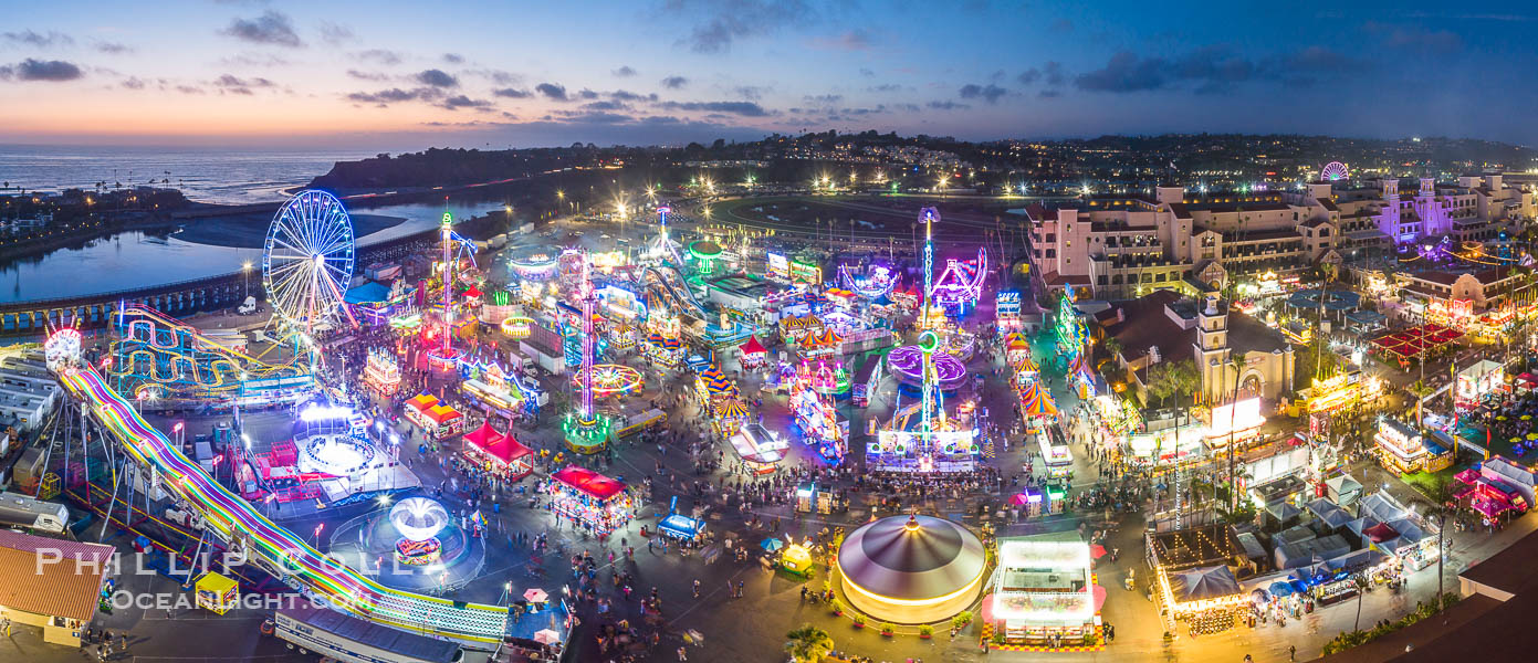 The San Diego County Fair at night, also called the Del Mar Fair, glows with many colorful lights and amusement rides at night in this aerial photo. California, USA, natural history stock photograph, photo id 39485