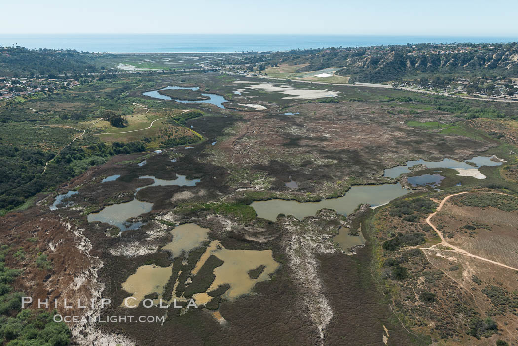 Aerial Photo of San Elijo Lagoon. San Elijo Lagoon Ecological Reserve is one of the largest remaining coastal wetlands in San Diego County, California, on the border of Encinitas, Solana Beach and Rancho Santa Fe. USA, natural history stock photograph, photo id 30588