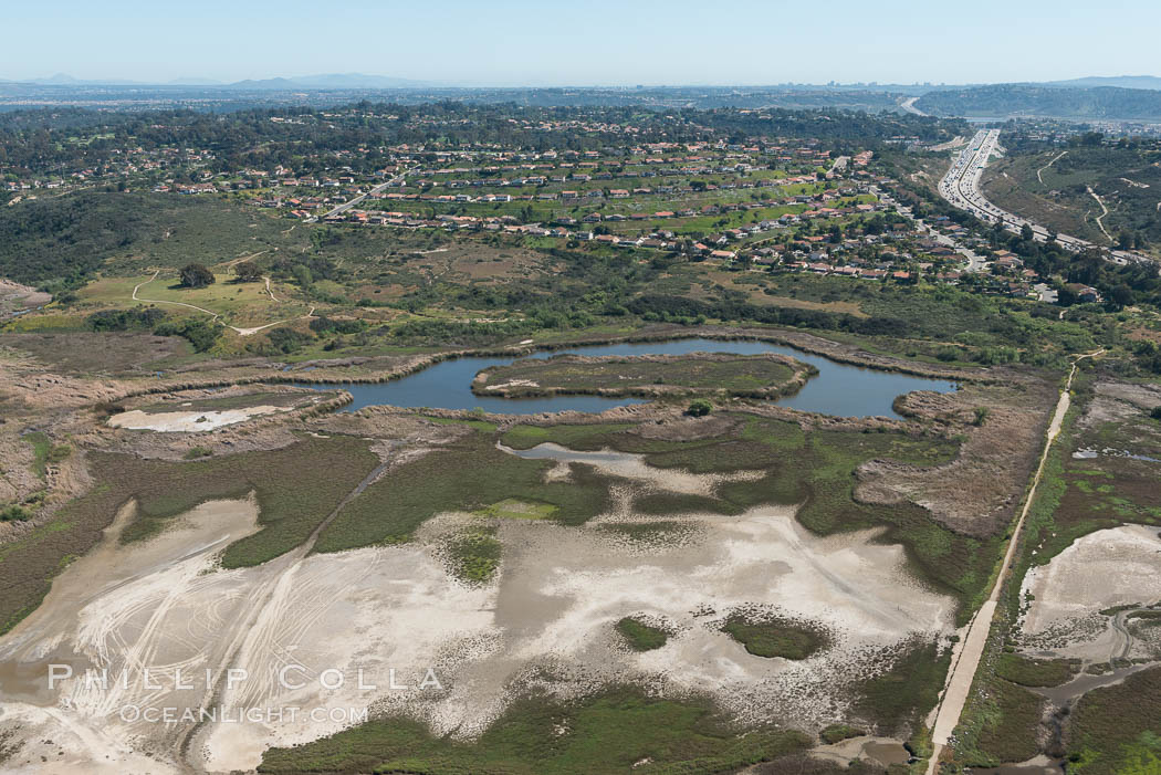 Aerial Photo of San Elijo Lagoon. San Elijo Lagoon Ecological Reserve is one of the largest remaining coastal wetlands in San Diego County, California, on the border of Encinitas, Solana Beach and Rancho Santa Fe. USA, natural history stock photograph, photo id 30591