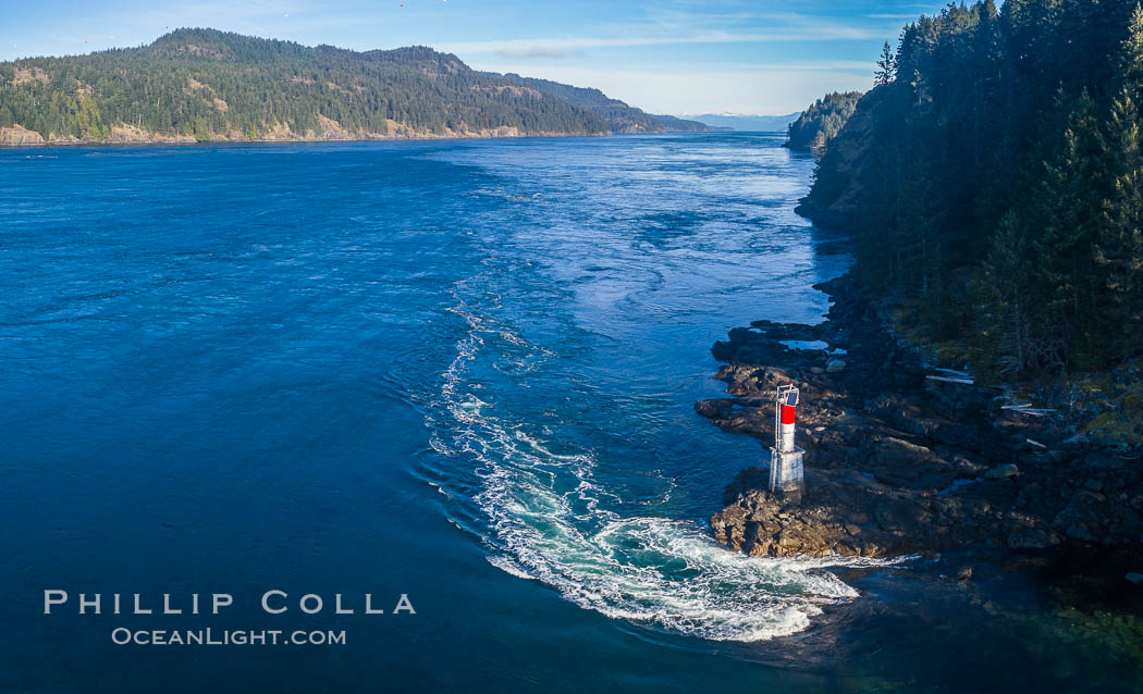 Seymour Narrows with strong tidal currents.  Between Vancouver Island and Quadra Island, Seymour Narrows is about 750 meters wide and has currents reaching 15 knots.  Aerial photo. British Columbia, Canada, natural history stock photograph, photo id 34474