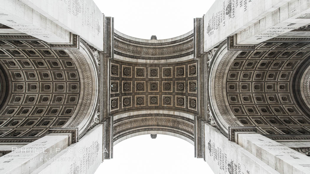 Arc de Triomphe. The Arc de Triomphe (Arc de Triomphe de l'Etoile) is one of the most famous monuments in Paris. It stands in the centre of the Place Charles de Gaulle (originally named Place de l'Etoile), at the western end of the Champs-Elysees. The Arc de Triomphe (in English: "Triumphal Arch") honors those who fought and died for France in the French Revolutionary and the Napoleonic Wars, with the names of all French victories and generals inscribed on its inner and outer surfaces. Beneath its vault lies the Tomb of the Unknown Soldier from World War I. The monument was designed by Jean Chalgrin in 1806, and its iconographic program pitted heroically nude French youths against bearded Germanic warriors in chain mail. It set the tone for public monuments, with triumphant patriotic messages. The monument stands 50 metres (164 ft) in height, 45 m (148 ft) wide and 22 m (72 ft) deep., natural history stock photograph, photo id 28079