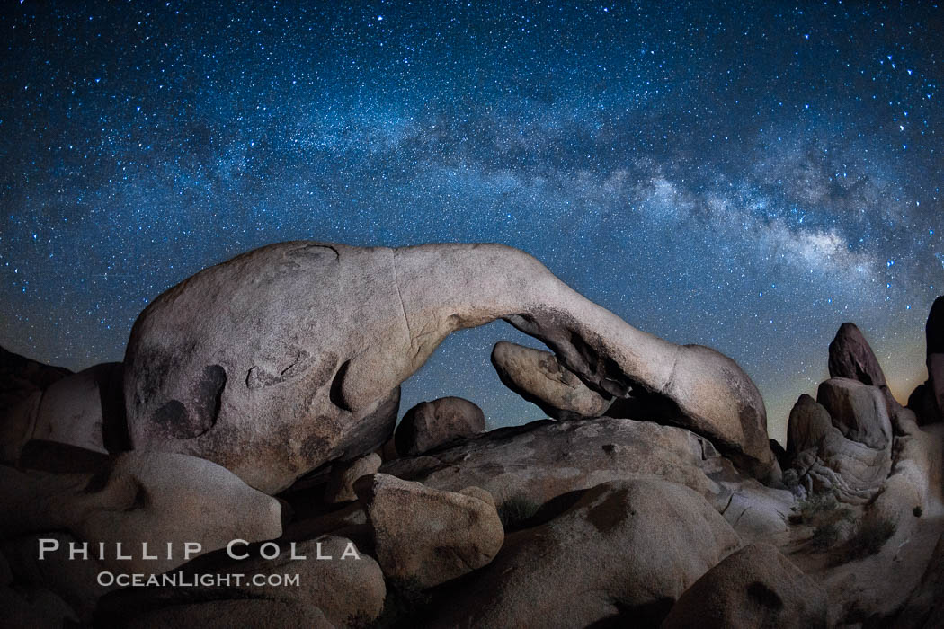The Milky Way galaxy above Arch Rock, Joshua Tree National Park, night star field exposure. California, USA, natural history stock photograph, photo id 26862