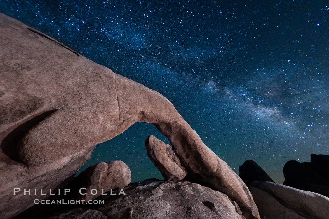 The Milky Way galaxy above Arch Rock, Joshua Tree National Park, night star field exposure. California, USA, natural history stock photograph, photo id 26863