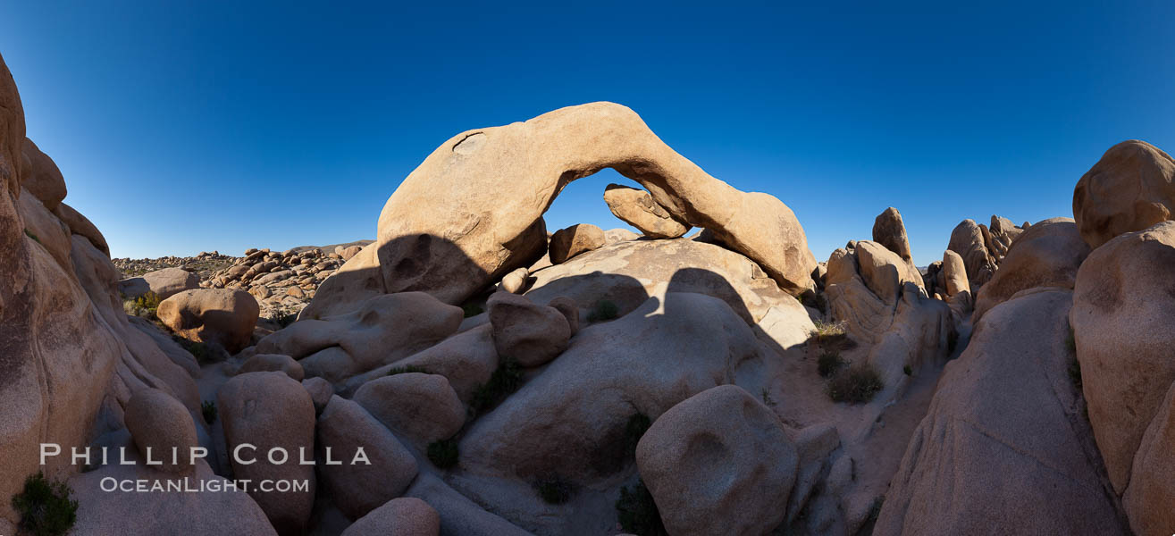 Panorama of Arch Rock, showing ancient stone boulders that are characteristic of Joshua Tree National Park. California, USA, natural history stock photograph, photo id 26799