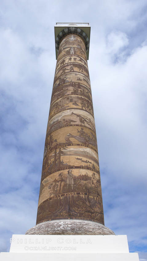 The Astoria Column rises 125 feet above Coxcomb Hill, site of the first permanent American Settlement west of the Rockies, itself 600 feet above Astoria.  It was erected in 1926 and has been listed in the National Register of Historic Places since 1974.  The column displays 14 scenes commemorating important events in the history of Astoria in cronological order. An interior 164-step spiral staircase leads to the top of a viewing platform with spectacular views. Oregon, USA, natural history stock photograph, photo id 19446