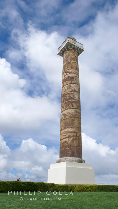 The Astoria Column rises 125 feet above Coxcomb Hill, site of the first permanent American Settlement west of the Rockies, itself 600 feet above Astoria.  It was erected in 1926 and has been listed in the National Register of Historic Places since 1974.  The column displays 14 scenes commemorating important events in the history of Astoria in cronological order. An interior 164-step spiral staircase leads to the top of a viewing platform with spectacular views. Oregon, USA, natural history stock photograph, photo id 19444