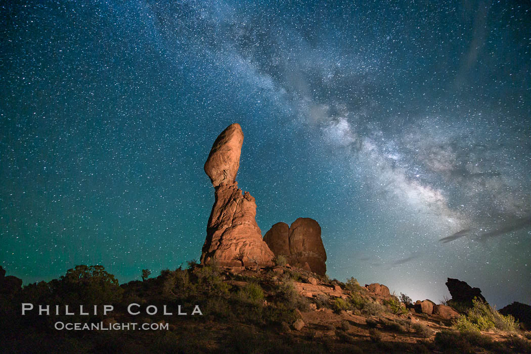 Balanced Rock and Milky Way stars at night. (Note: this image was created before a ban on light-painting in Arches National Park was put into effect.  Light-painting is no longer permitted in Arches National Park). Utah, USA, natural history stock photograph, photo id 27831