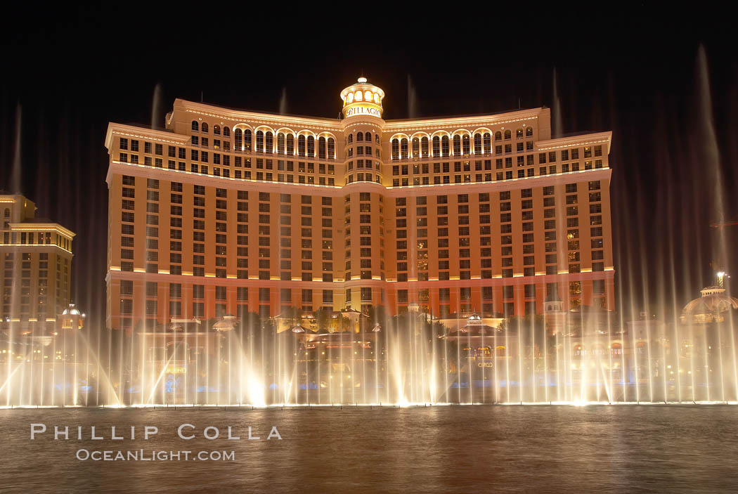 The Bellagio Hotel fountains, at night.  The Bellagio Hotel fountains are one of the most popular attractions in Las Vegas, showing every half hour or so throughout the day, choreographed to famous Hollywood music. Nevada, USA, natural history stock photograph, photo id 20575