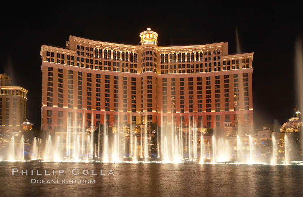 The Bellagio Hotel fountains, at night.  The Bellagio Hotel fountains are one of the most popular attractions in Las Vegas, showing every half hour or so throughout the day, choreographed to famous Hollywood music. Nevada, USA, natural history stock photograph, photo id 20557