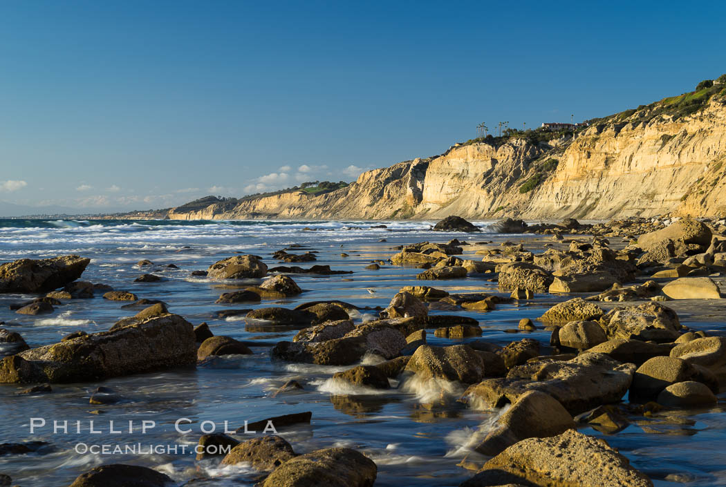 Black's Beach sea cliffs, sunset, looking north from Scripps Pier with Torrey Pines State Reserve in the distance. La Jolla, California, USA, natural history stock photograph, photo id 29167