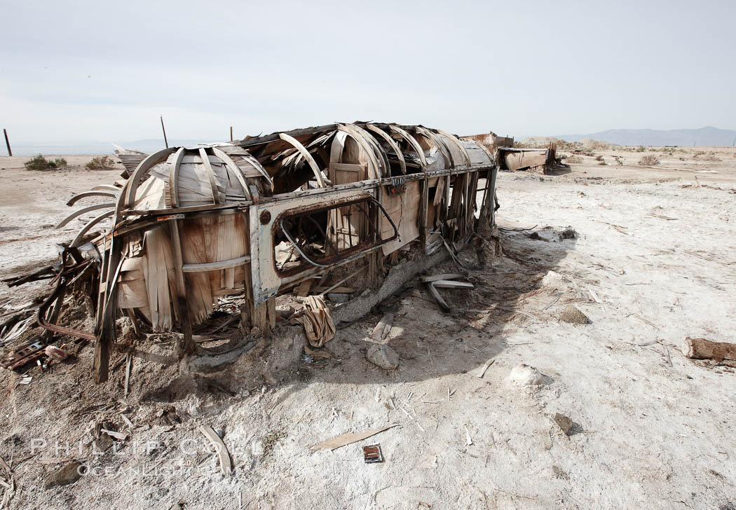 Bombay Beach, lies alongside and below the flood level of the Salton Sea, so that it floods occasionally when the Salton Sea rises.  A part of Bombay Beach is composed of derelict old trailer homes, shacks and wharfs, slowly sinking in the mud and salt. Imperial County, California, USA, natural history stock photograph, photo id 22498