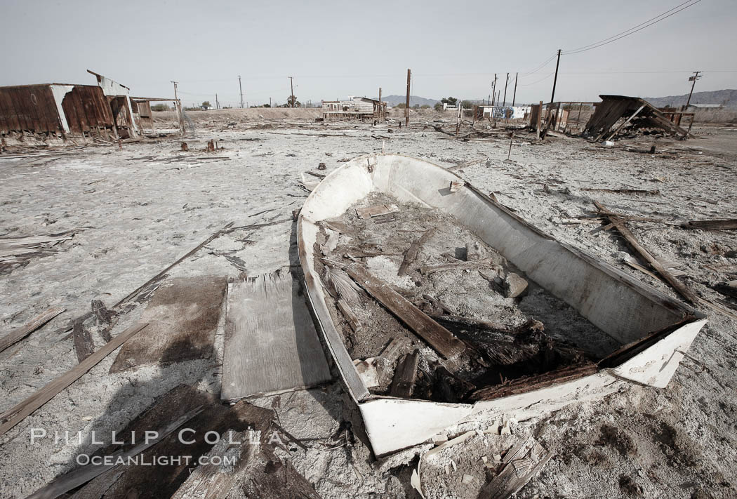 Bombay Beach, lies alongside and below the flood level of the Salton Sea, so that it floods occasionally when the Salton Sea rises.  A part of Bombay Beach is composed of derelict old trailer homes, shacks and wharfs, slowly sinking in the mud and salt. Imperial County, California, USA, natural history stock photograph, photo id 22499