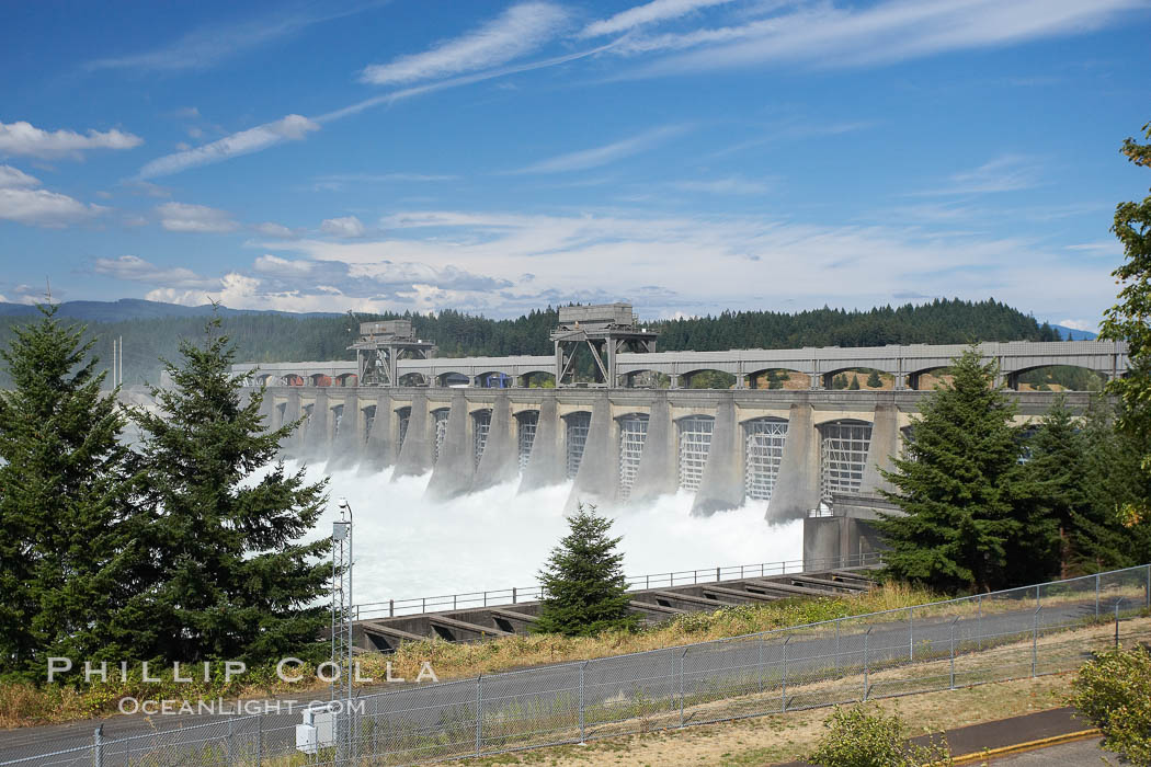 Bonneville Lock and Dam consists of several dam structures that together complete a span of the Columbia River between the US states of Oregon and Washington. The dam is located 40 miles east of Portland, Oregon, in the Columbia River Gorge. The primary functions of Bonneville Lock and Dam are those of electrical power generation and river navigation. Bonneville Dam and Locks, USA, natural history stock photograph, photo id 19370