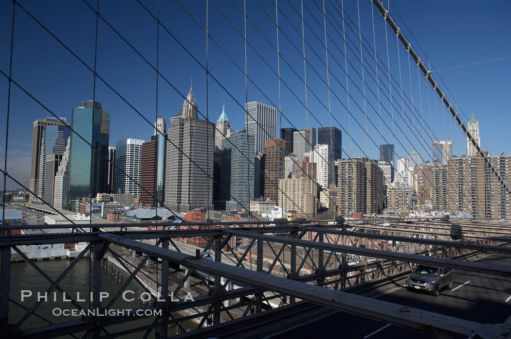 Lower Manhattan skyline viewed from the Brooklyn Bridge. New York City, USA, natural history stock photograph, photo id 11093