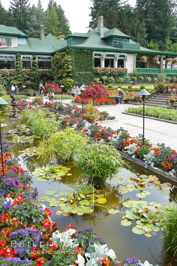 Butchart Gardens, a group of floral display gardens in Brentwood Bay, British Columbia, Canada, near Victoria on Vancouver Island. It is an internationally-known tourist attraction which receives more than a million visitors each year., natural history stock photograph, photo id 21135