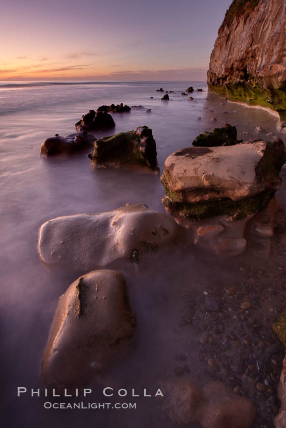 Sunset, sea cliffs, rocks and swirling water blurred in a long time exposure. Carlsbad, California, USA, natural history stock photograph, photo id 22197