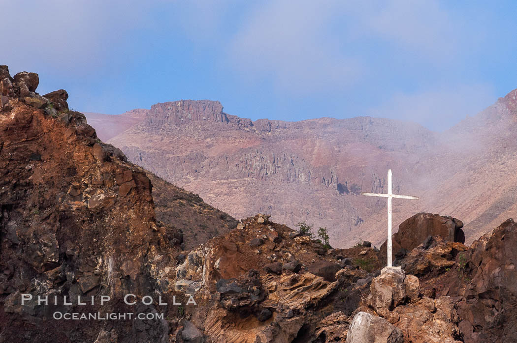 Lighthouse and cross mark the site of a small fishing shack and old chapel and prison near the north end of Guadalupe Island (Isla Guadalupe). Baja California, Mexico, natural history stock photograph, photo id 09731