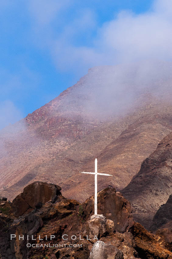 Lighthouse and cross mark the site of a small fishing shack and old chapel and prison near the north end of Guadalupe Island (Isla Guadalupe). Baja California, Mexico, natural history stock photograph, photo id 09729