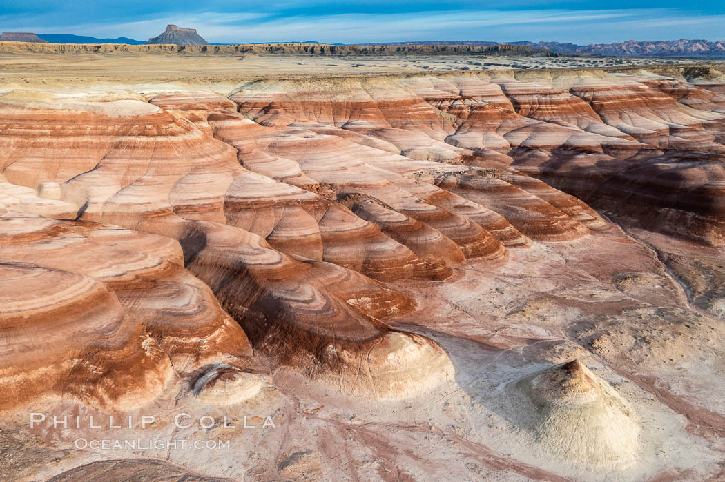 Chinle Formations, formed in the Upper Triassic period, are seen as striations in the deeply eroded Utah badlands. USA, natural history stock photograph, photo id 38172