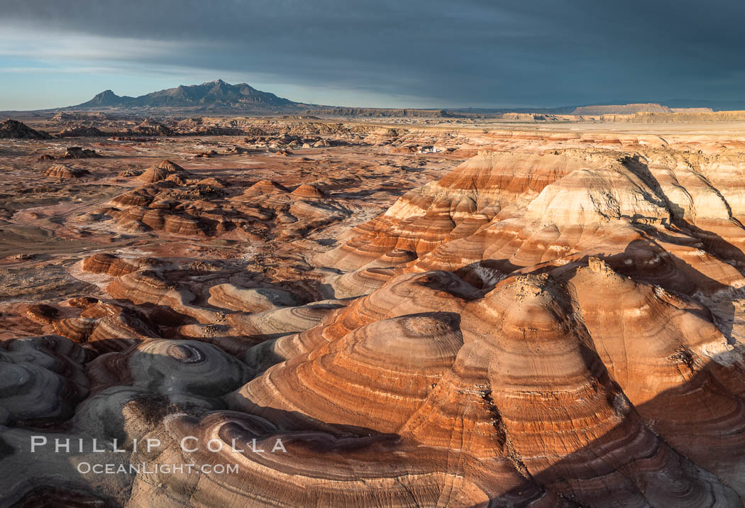 Chinle Formations, formed in the Upper Triassic period, are seen as striations in the deeply eroded Utah badlands. USA, natural history stock photograph, photo id 38171