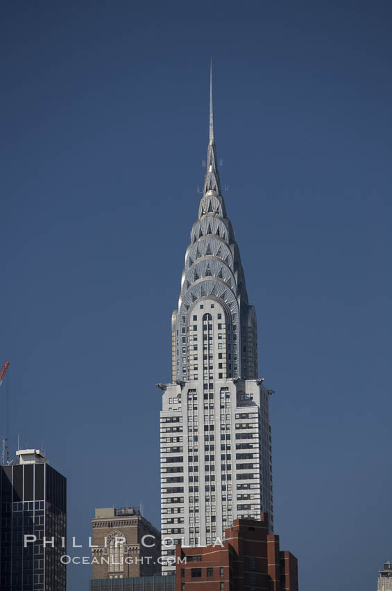 The Chrysler Building rises above the New York skyline as viewed from the East River. Manhattan, New York City, USA, natural history stock photograph, photo id 11133