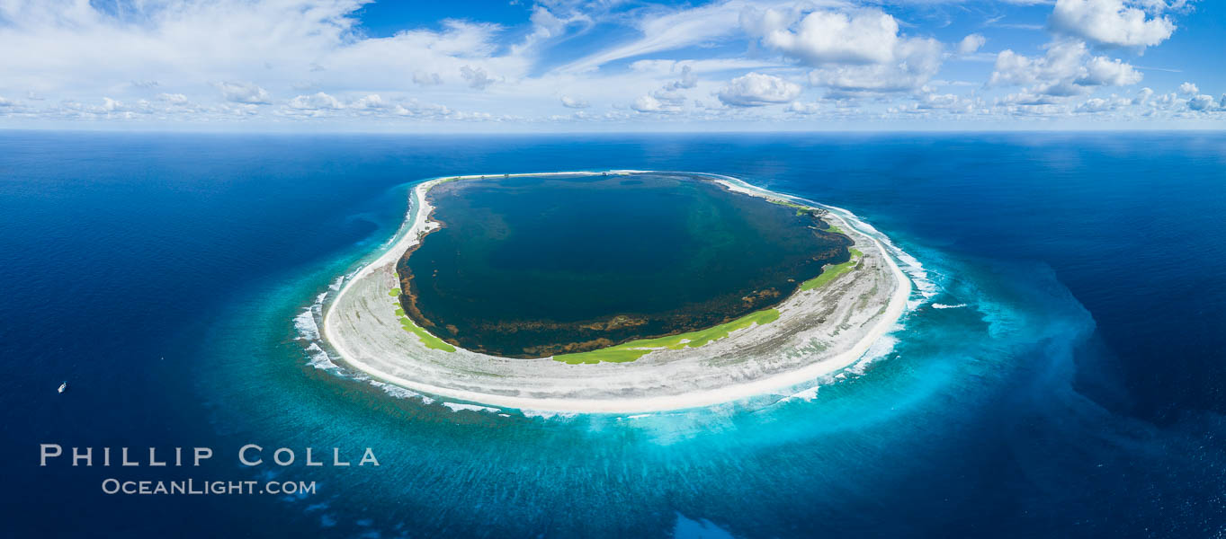Aerial panorama of Clipperton Island, showing the entire atoll.  Clipperton Island, a minor territory of France also known as Ile de la Passion, is a small (2.3 sq mi) but  spectacular coral atoll in the eastern Pacific. By permit HC / 1485 / CAB (France)., natural history stock photograph, photo id 32932