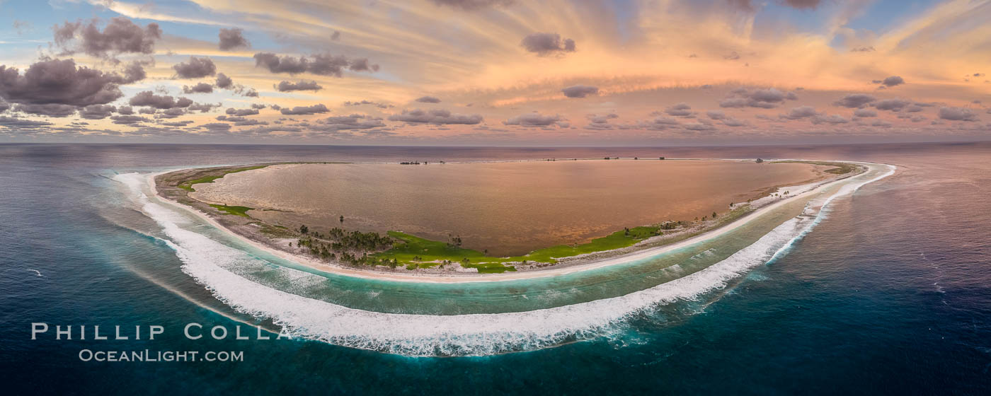 Sunset at Clipperton Island, aerial panoramic photo showing the entire atoll.  Clipperton Island, a minor territory of France also known as Ile de la Passion, is a small (2.3 sq mi) but  spectacular coral atoll in the eastern Pacific. By permit HC / 1485 / CAB (France)., natural history stock photograph, photo id 32933