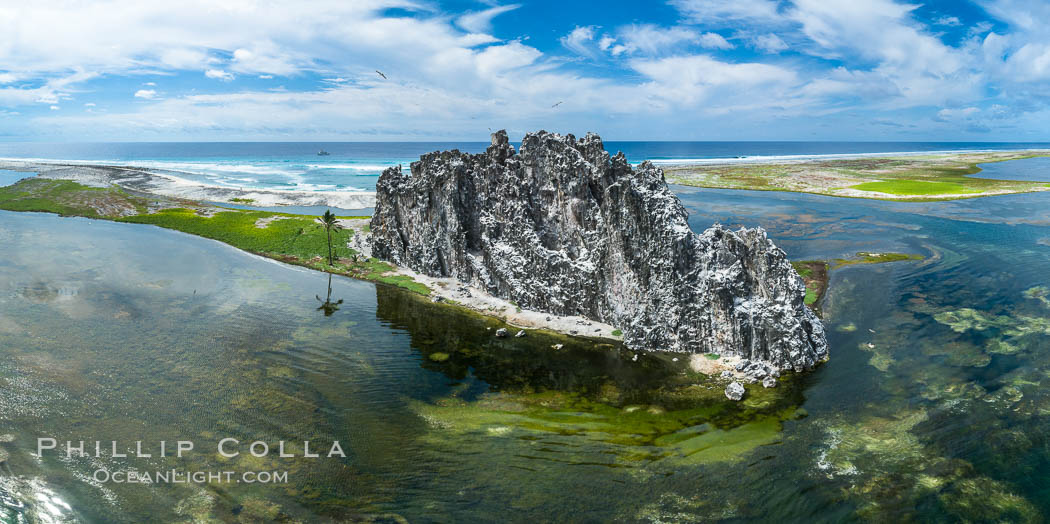 Clipperton Rock, a 95' high volcanic remnant, is the highest point on Clipperton Island, a spectacular coral atoll in the eastern Pacific. By permit HC / 1485 / CAB (France)., natural history stock photograph, photo id 32941