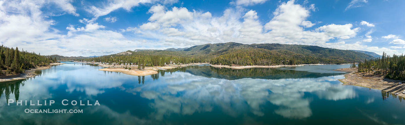 Clouds reflected on calm Bass Lake, aerial photo, panorama. California, USA, natural history stock photograph, photo id 38527