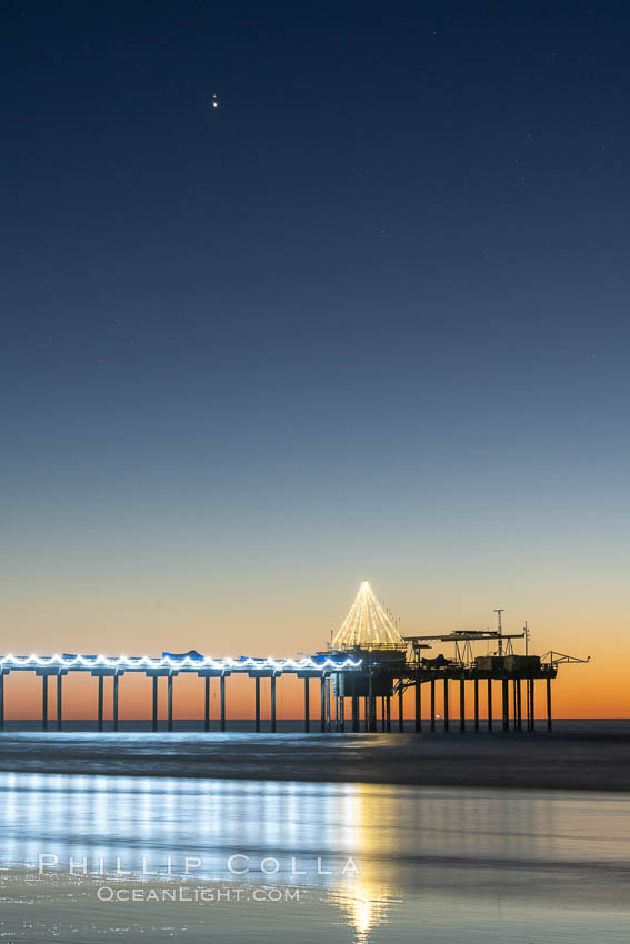 Conjuction of Saturn and Jupiter over Scripps Institution of Oceanography Research Pier at sunset, with Christmas Lights and Christmas Tree. La Jolla, California, USA, natural history stock photograph, photo id 36616