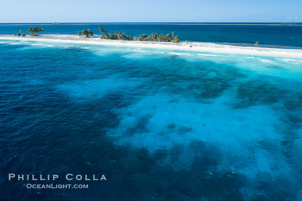 Coral Reef at Clipperton Island, aerial photo. Clipperton has healthy, beatiful coral reefs.  The white beaches are composed of white coralline rubble. Clipperton Island, a minor territory of France also known as Ile de la Passion, is a spectacular coral atoll in the eastern Pacific. By permit HC / 1485 / CAB (France)., natural history stock photograph, photo id 32896