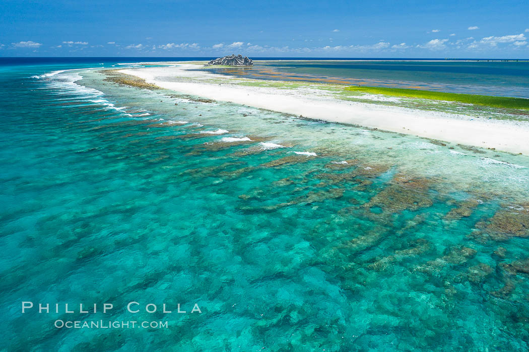 Coral Reef at Clipperton Island, aerial photo. Clipperton has healthy, beautiful coral reefs.  The white beaches are composed of white coralline rubble. Clipperton Island, a minor territory of France also known as Ile de la Passion, is a spectacular coral atoll in the eastern Pacific. By permit HC / 1485 / CAB (France)., natural history stock photograph, photo id 32899