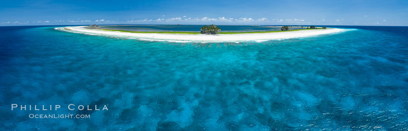 Coral Reef at Clipperton Island, aerial photo. Clipperton has healthy, beatiful coral reefs.  The white beaches are composed of white coralline rubble. Clipperton Island, a minor territory of France also known as Ile de la Passion, is a spectacular coral atoll in the eastern Pacific. By permit HC / 1485 / CAB (France)., natural history stock photograph, photo id 32935