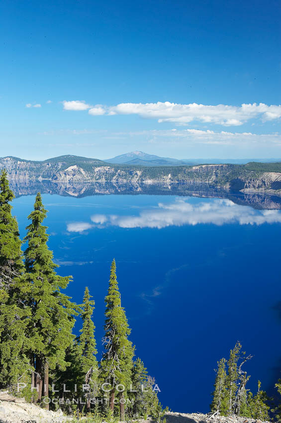 Crater Lake. Crater Lake is the six-mile wide lake inside the collapsed caldera of volcanic Mount Mazama. Crater Lake is the deepest lake in the United States and the seventh-deepest in the world. Its maximum recorded depth is 1996 feet (608m). It lies at an altitude of 6178 feet (1880m). Crater Lake National Park, Oregon, USA, natural history stock photograph, photo id 13940