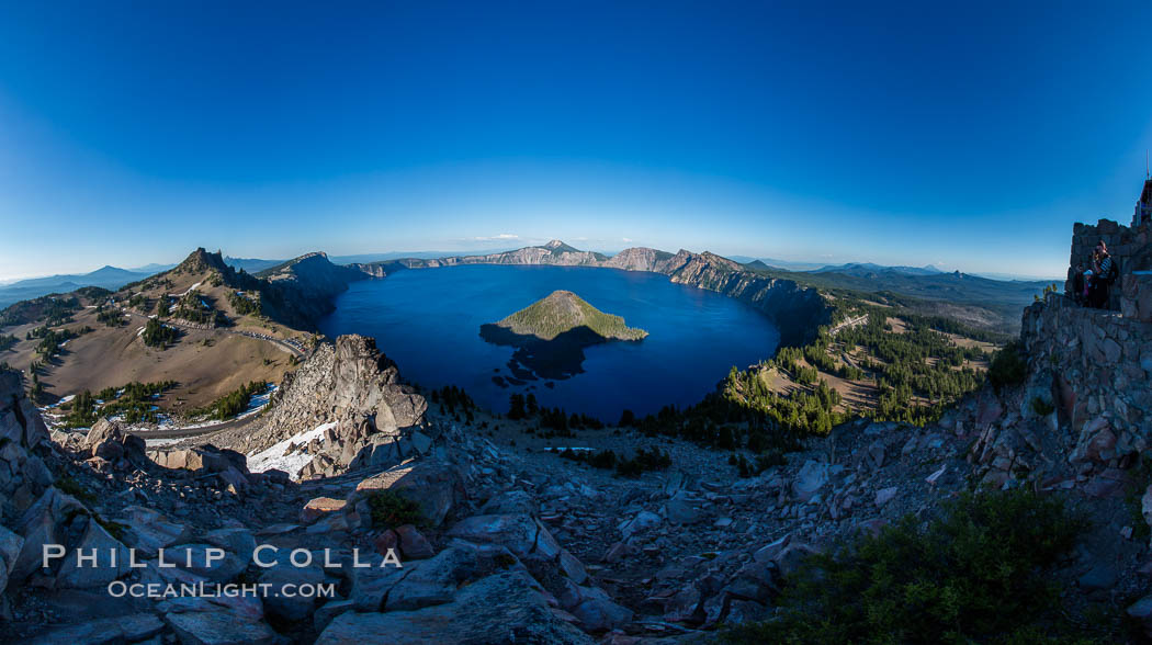 Panorama of Crater Lake from Watchman Lookout Station, panoramic picture. The Watchman Lookout Station No. 168 is one of two fire lookout towers in Crater Lake National Park in southern Oregon. For many years, National Park Service personnel used the lookout to watch for wildfires during the summer months. It is also a popular hiking destination because it offers an excellent view of Crater Lake and the surrounding area. USA, natural history stock photograph, photo id 28647