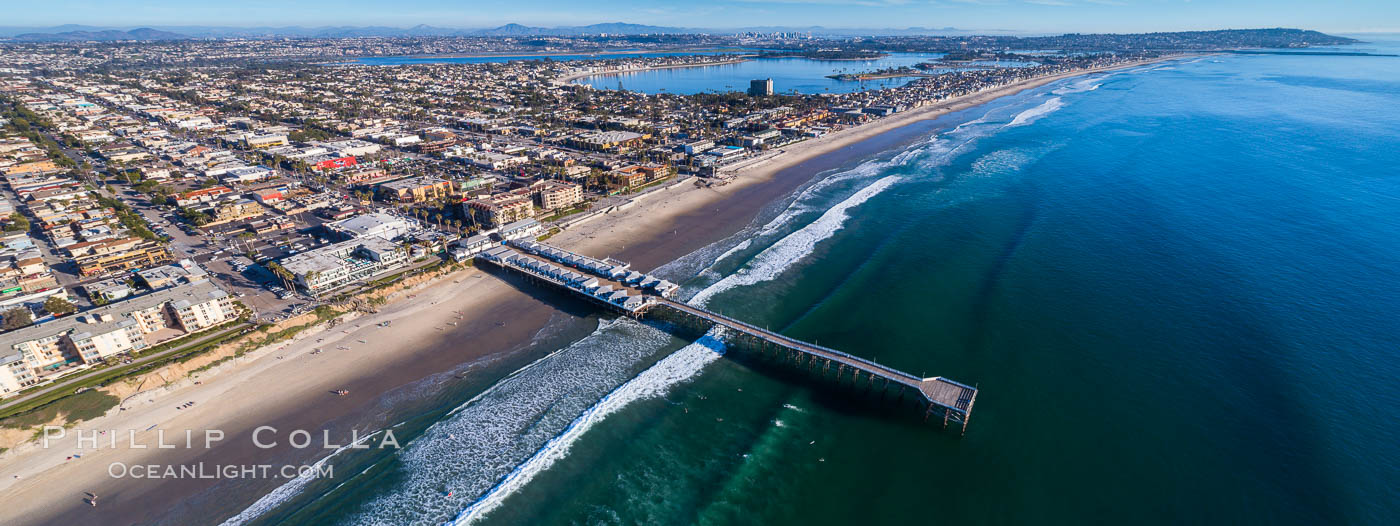 Aerial Photo of Crystal Pier, 872 feet long and built in 1925, extends out into the Pacific Ocean from the town of Pacific Beach. Panoramic photo. California, USA, natural history stock photograph, photo id 38079