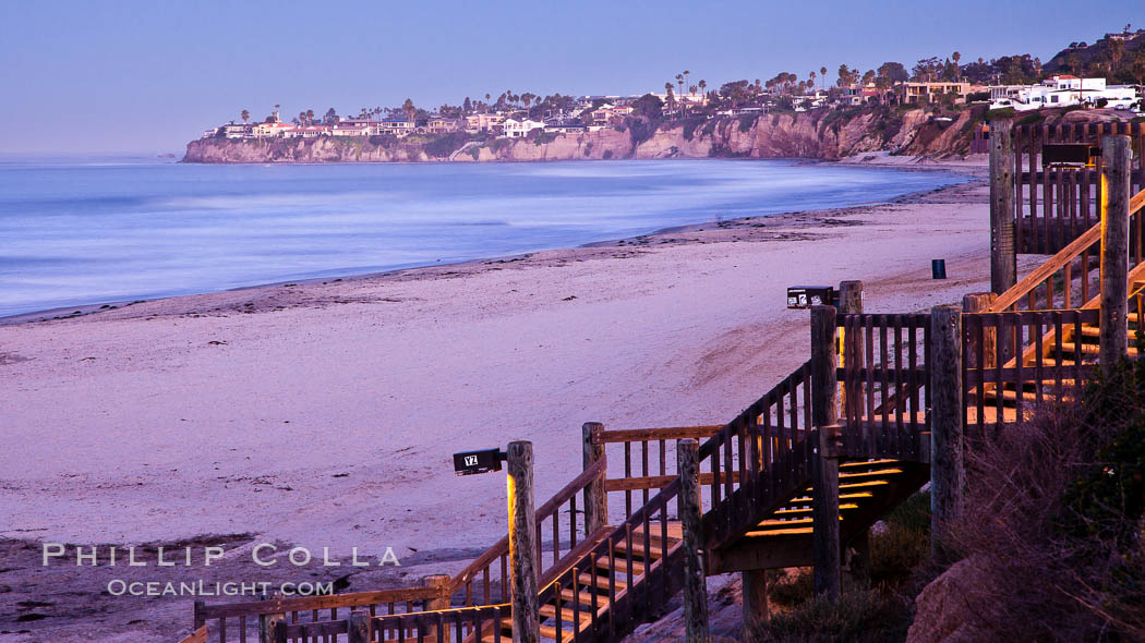 The Crystal Pier and Pacific Ocean at sunrise, dawn, waves blur as they crash upon the sand.  Crystal Pier, 872 feet long and built in 1925, extends out into the Pacific Ocean from the town of Pacific Beach. California, USA, natural history stock photograph, photo id 27242