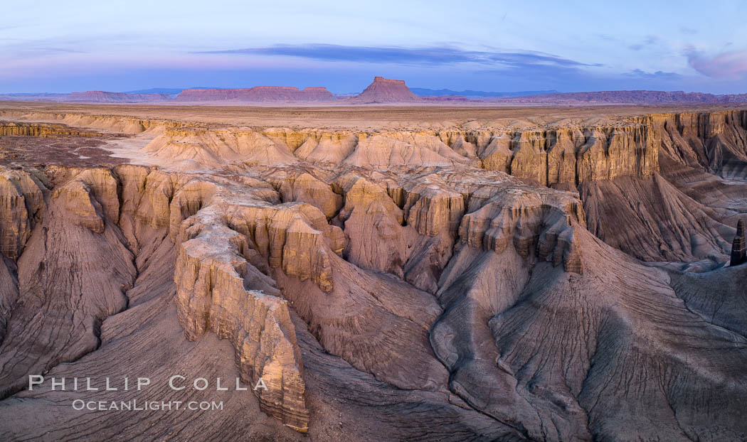 Dawn over the Skyline Rim, Factory Bench and Lower Blue Hills, Utah. Factory Butte is in the distance. USA, natural history stock photograph, photo id 38064