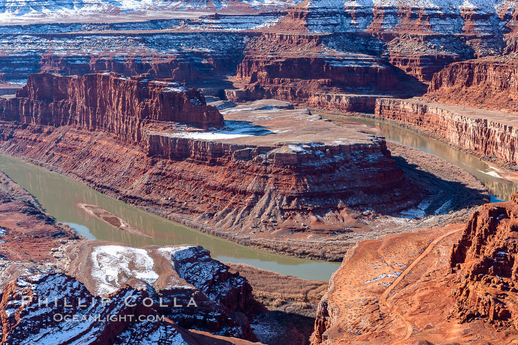 Dead Horse Point Overlook, with the Colorado River flowing 2,000 feet below.  300 million years of erosion has carved the expansive canyons, cliffs and walls below and surrounding Deadhorse Point. Deadhorse Point State Park, Utah, USA, natural history stock photograph, photo id 18091