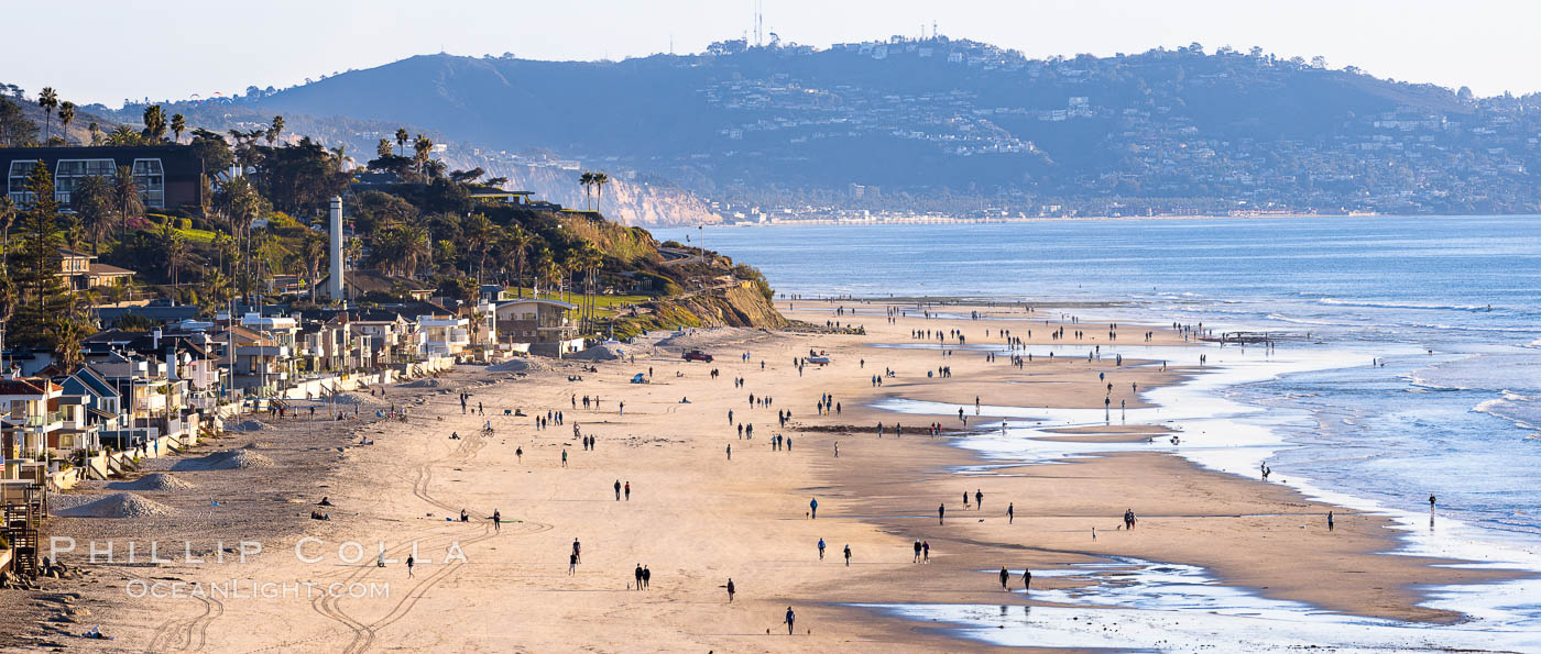 Del Mar Beach on the extreme low King Tide, people and dogs walking on the beach, late afternoon. California, USA, natural history stock photograph, photo id 37599