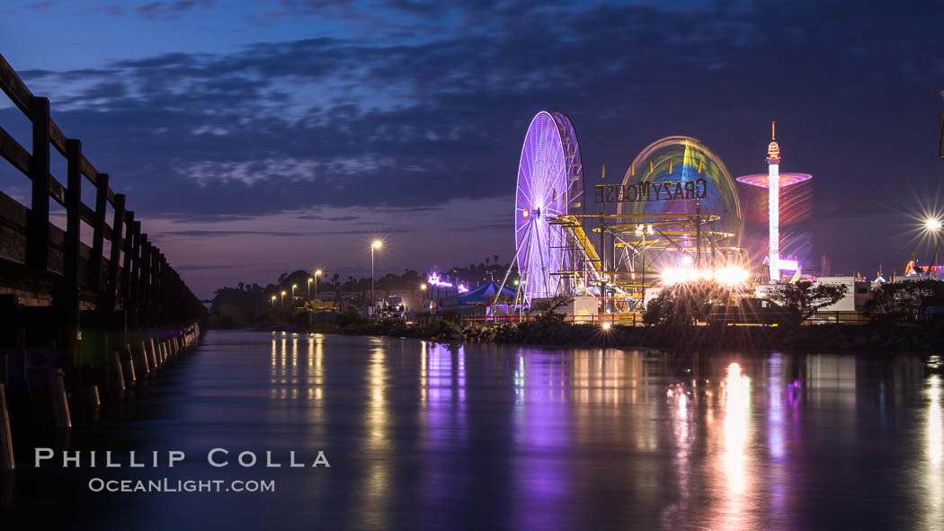 Del Mar Fair and San Dieguito Lagoon at Night.  Lights from the San Diego Fair reflect in San Dieguito Lagooon, with the train track trestles to the left. California, USA, natural history stock photograph, photo id 31023