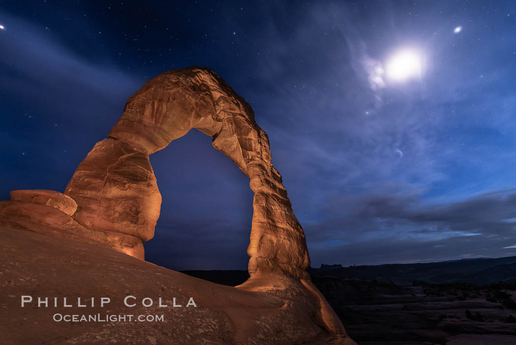 Delicate Arch with Stars and Moon, at night, Arches National Park. Utah, USA, natural history stock photograph, photo id 29286