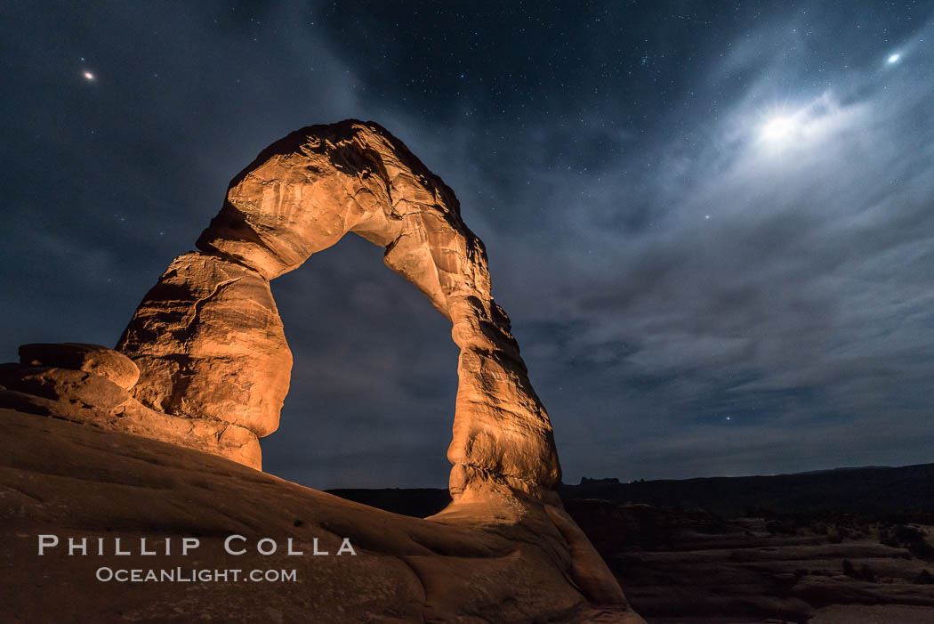 Delicate Arch with Stars and Moon, at night, Arches National Park. Utah, USA, natural history stock photograph, photo id 29287