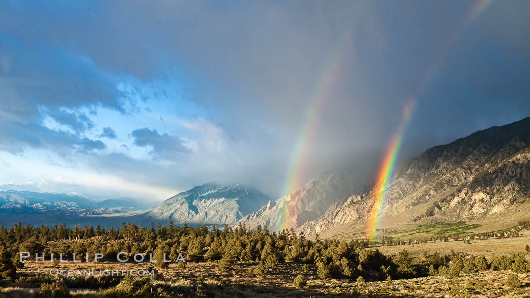 Double rainbow forms in storm clouds, over Swall Meadows and Round Valley in the Eastern Sierra Nevada., natural history stock photograph, photo id 26883